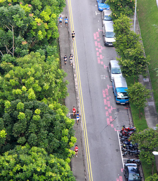 Runners approach the HDB block