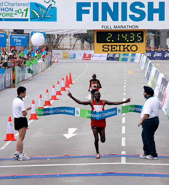 Charles Mwai Kanyao finishes a mere five seconds ahead of his rival