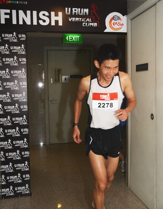 Ang Chee Yong, Winner, 10KM + Vertical Climb Men's Open category - at the finish line NTUC Centre roof 