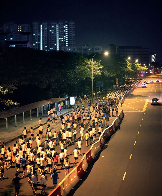 21km and 42km runners pounding the streets of Singapore