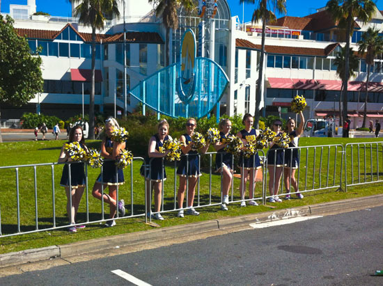 Cheer leaders lining the streets