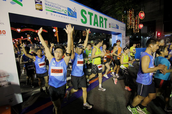 42km runners soaking into the festive mood at Orchard.
