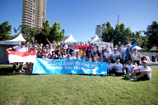 Singaporeans runners and families gather for a shot after the race.