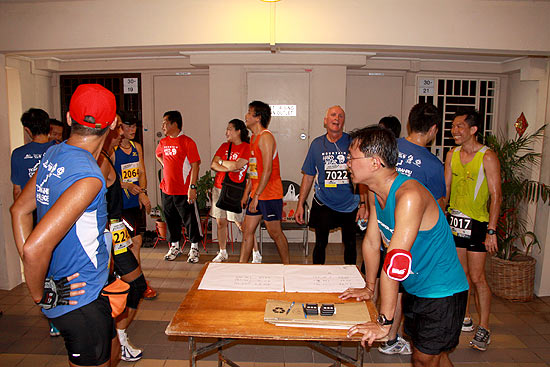 Runners mingle after the race along the common corridor