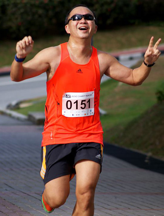 Tan Tze Siong embracing his first FINISH of the year